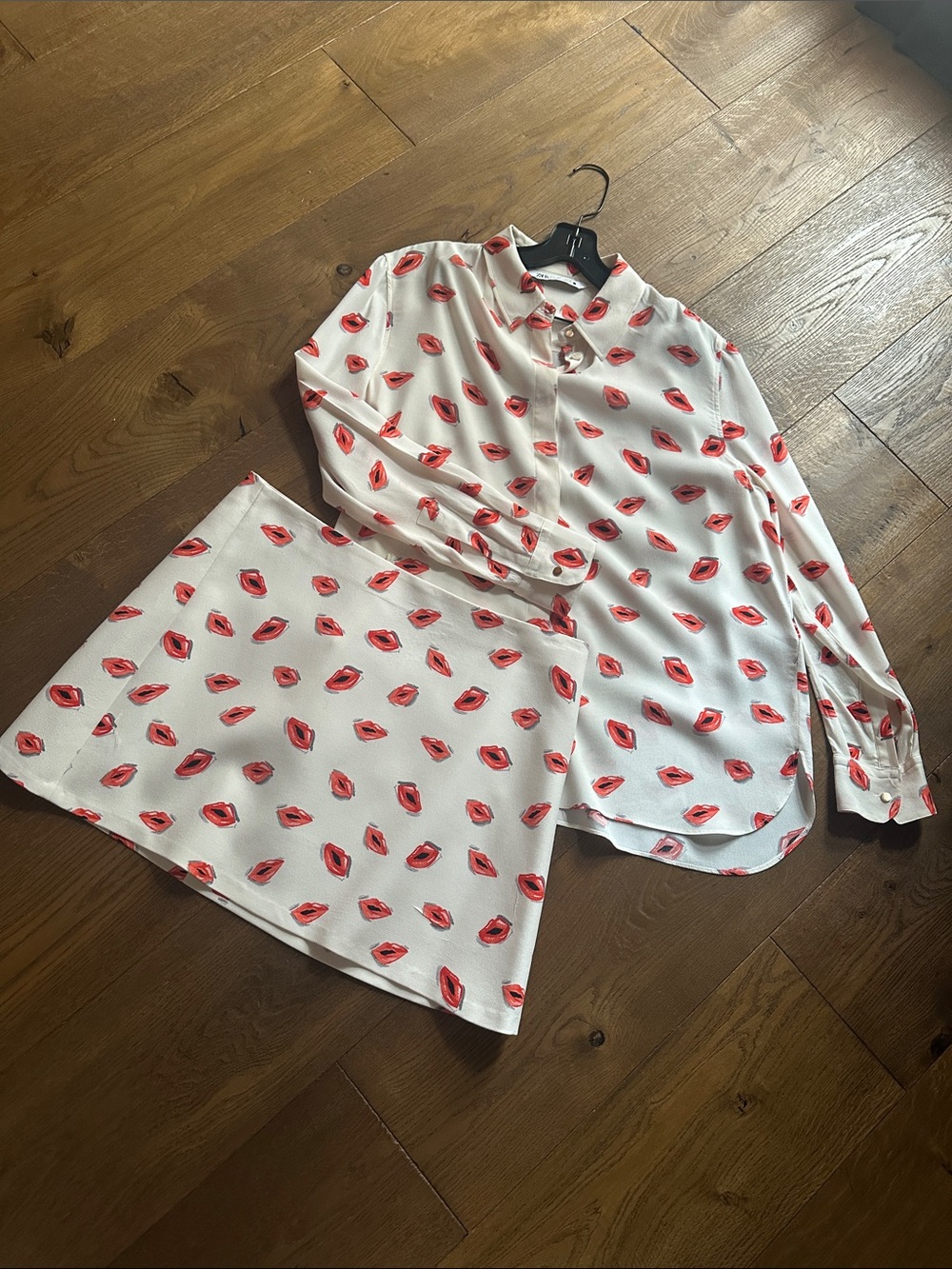 ZARA Cream Button-Up Blouse with Orange Lip Print with matching skirt